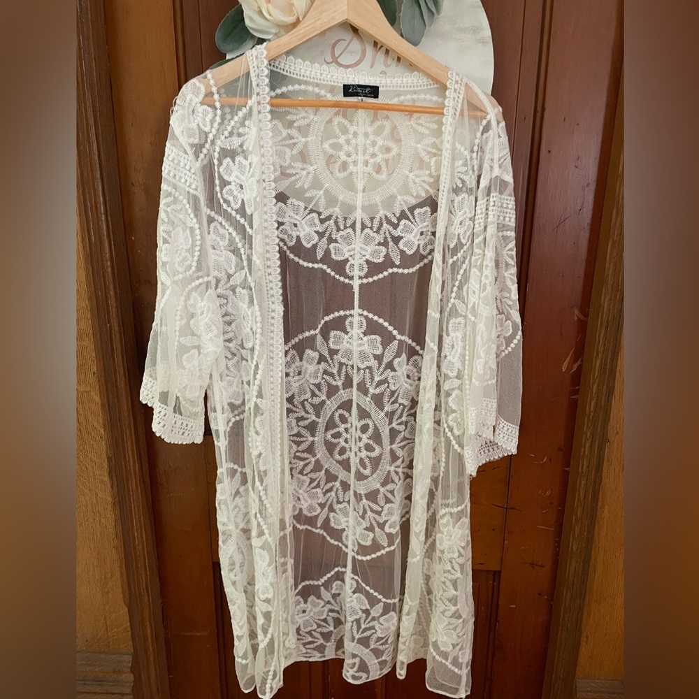 Bathing suit cover up. Never worn. White lace